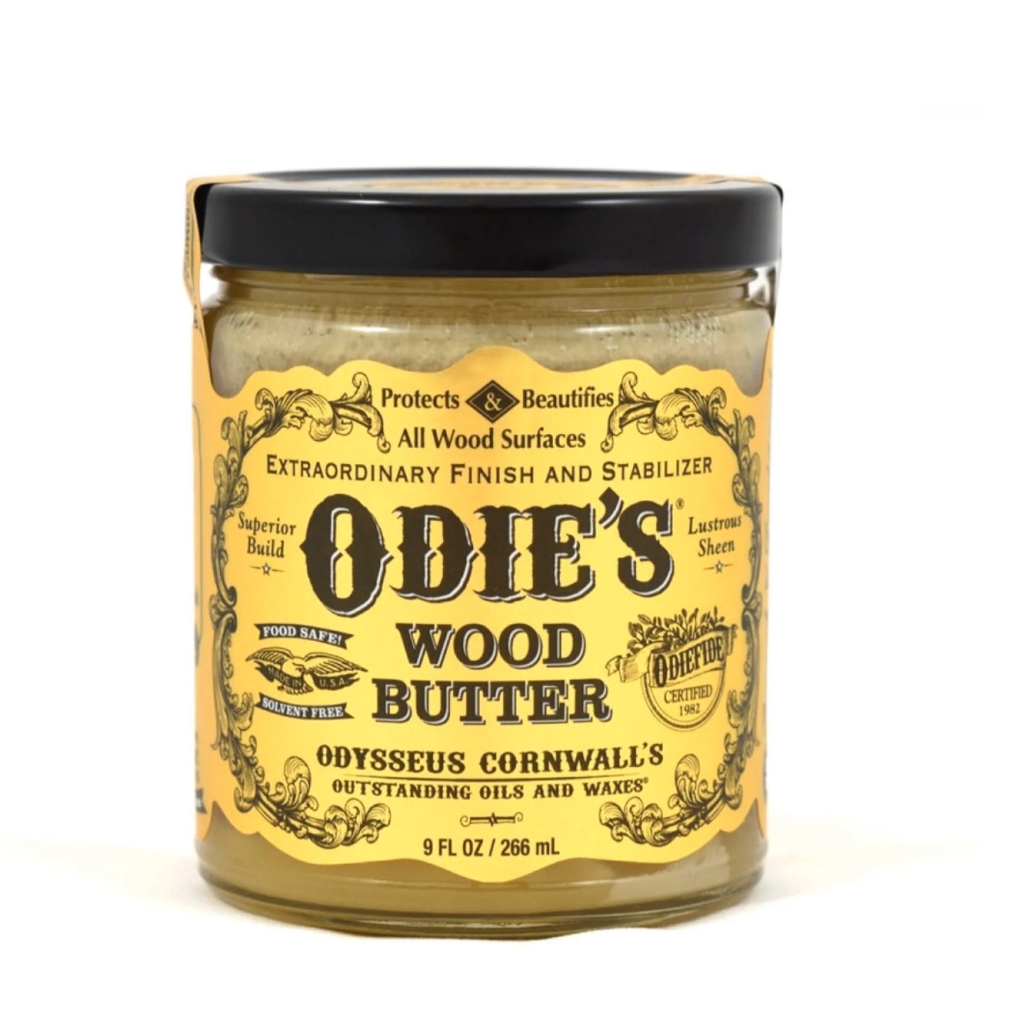 Jar of Odie's Wood Butter with yellow label on a white background