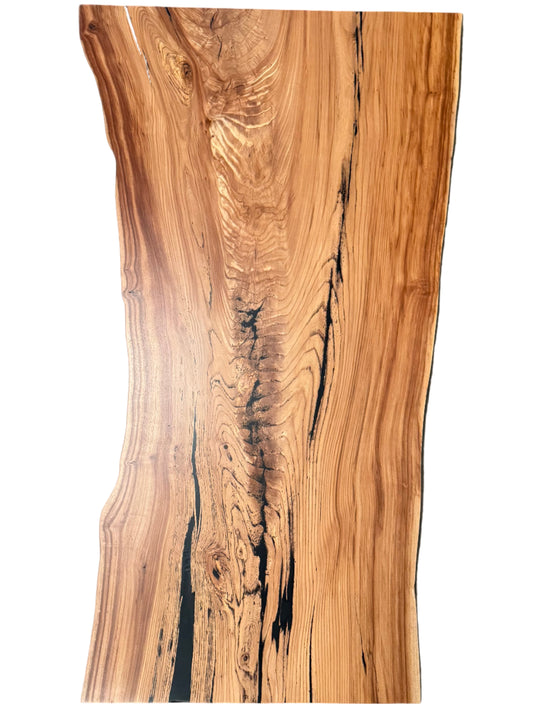 dining table made from live edge elm wood